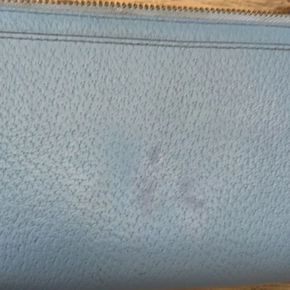 Kate spade blush wallet.